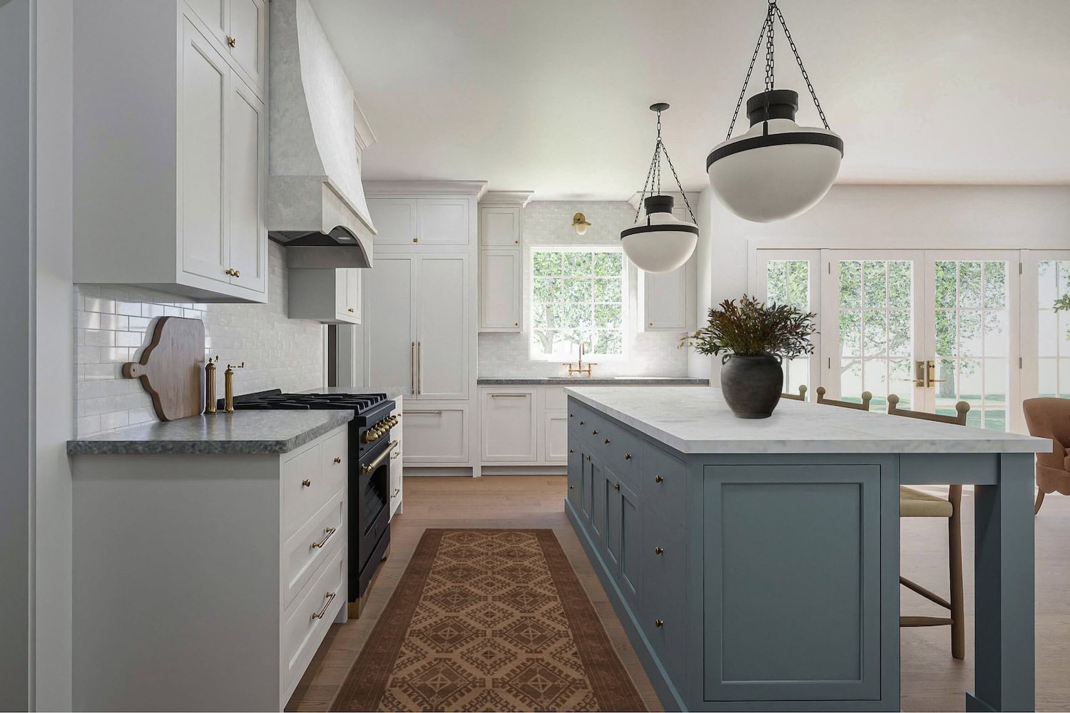 View of kitchen with a blue island, white cabinets, traditional pendants, and antique runner.